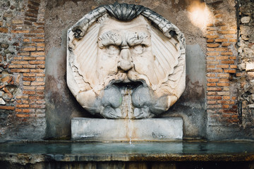 Fountain at the entrance to the Orange Garden, Rome, Italy