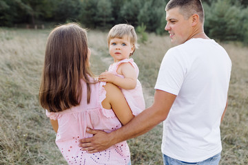 Fototapeta premium Happy family outdoors spending time together