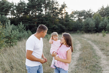 Happy family outdoors spending time together