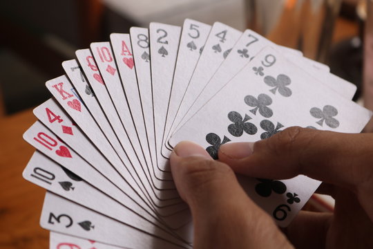 Playing cards during the day.