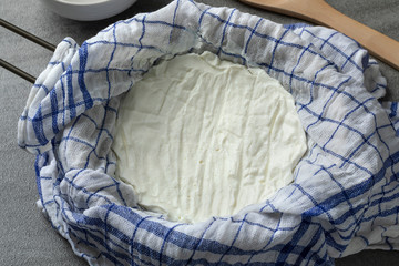Homemade strained yogurt close up
