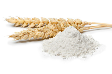 Heap of white wheat flour close up