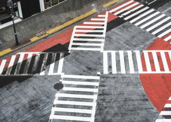 Empty crosswalks on dirty road in downtown during disaster and pestilence