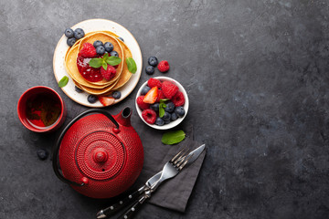 Obraz na płótnie Canvas Delicious homemade pancakes with summer berries