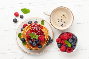 Delicious homemade pancakes with summer berries