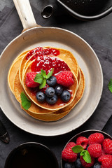 Delicious homemade pancakes with summer berries