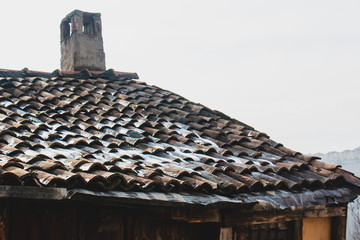 Roof of a house with rain