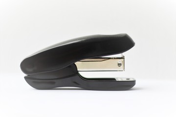 Stapler with white background in an office on a desk