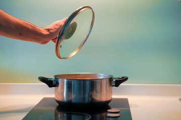 Cooking soup in a pan on an induction stove