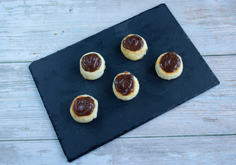 Cheesecakes with bitter chocolate and different berries