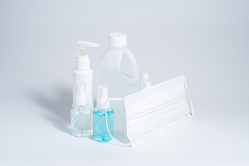 Alcohol gel, liquid and mask set in bottles for hand cleaning, virus cleaner set