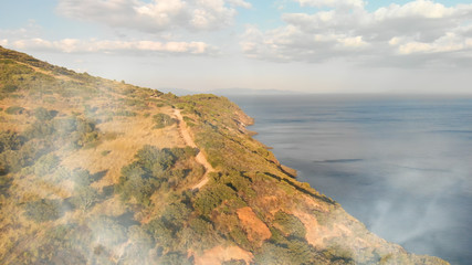 Beautiful coastline of Elba Island at dusk, Italy from drone