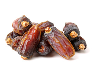 Delicious fresh organic dates on white background