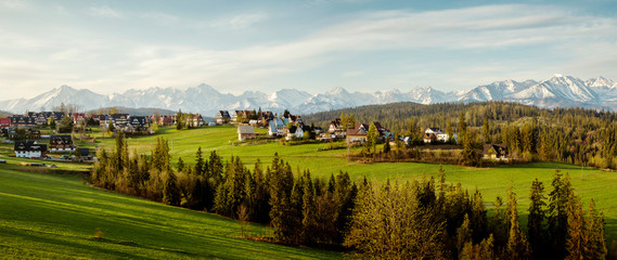 Panorama of Bukowina Tatrzanska with Tatra mountains in the background, Poland