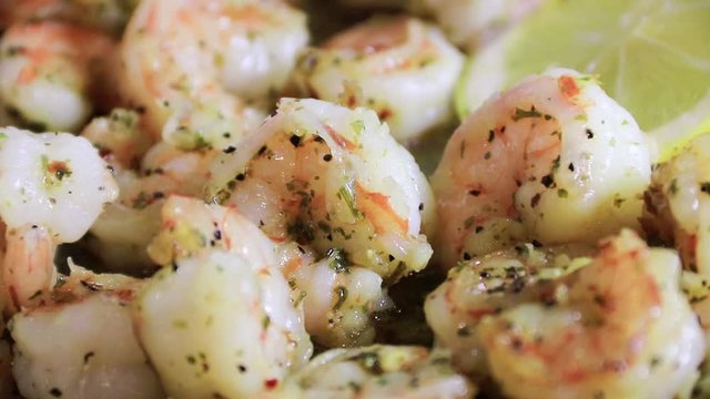Shrimp Scampi with fresh lemon garlic parsley saute  panning moving up