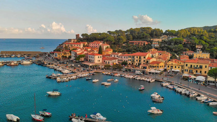 Fototapeta na wymiar Marina Di Campo, Elba Island. Beautiful aerial view of townscape in Italy
