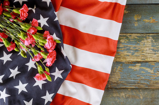 American flag on Memorial day honor respect patriotic military US in pink carnation