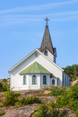 Fototapeta na wymiar Old wooden church in Hamburgersund on the Swedish west coast