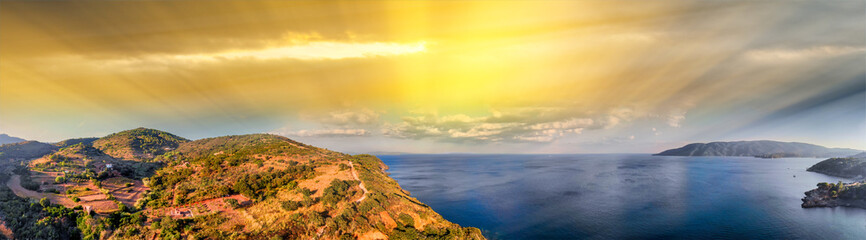 Elba Island at sunset, Italy. Beautiful coastline and hills landscape