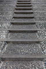Closeup low angle shot of cobblestone stairs