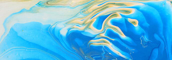 art photography of abstract marbleized effect background. Blue, gold and white creative colors. Beautiful paint