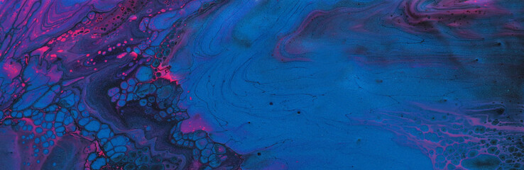 art photography of abstract marbleized effect background. Black, blue, pink and purple creative...