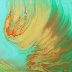 art photography of abstract marbleized effect background. Turquoise, green, gold and blue creative colors. Beautiful paint