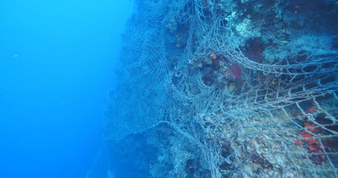 ghost hunting fish net so big underwater fisherman pollution underwater garbage environmental harming oceans