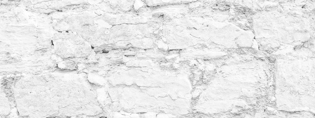 White horizontal background - texture of old stone masonry wall.