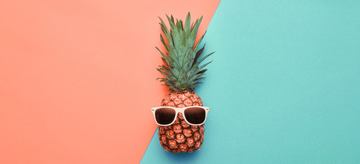 Fashion. Pineapple hipster in sunglasses, stylish fruit. Minimal concept, summer tropical...