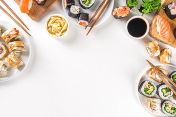 Japanese food. Big sushi set. Assorted set of various sashimi, maki and sushi rolls with different...