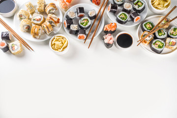 Japanese food. Big sushi set. Assorted set of various sashimi, maki and sushi rolls with different...