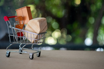 Shopping cart full of furniture. Concept of shopping furniture