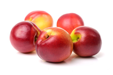 ripe peach on white background