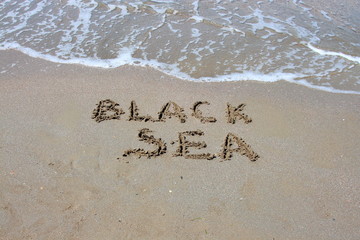 inscription on the sea sand black sea