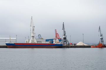 Industrial harbor cranes in the seaport