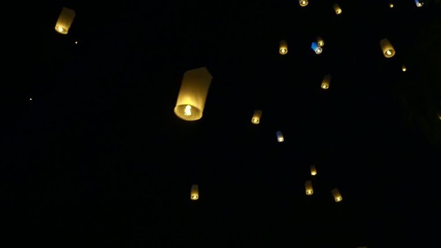 Lanna Yipeng festival during Loy krathong in Thailand laterns floating in full moon sky