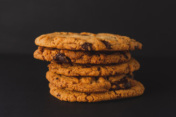 Cookies stacked with a black background