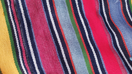 Striped fabric texture background. Texture of traditional Turkish ethnic carpet closeup