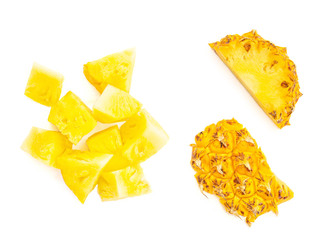 Pineapple pieces and chunks  isolated on white background. Cut pineapple slice Top view. Flat lay
