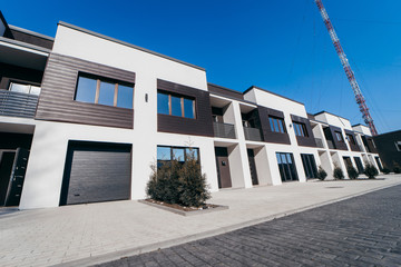 A row of a new townhouses in city