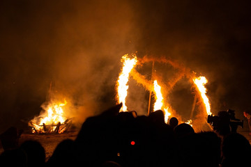Some form of puppet is being burned