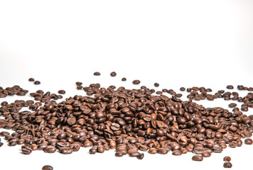 coffee beans roasted on a white background with copy space for your text