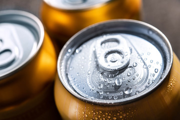 Close-up of three beer cans