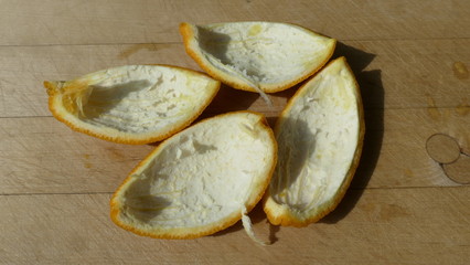 four orange peels from a fruit