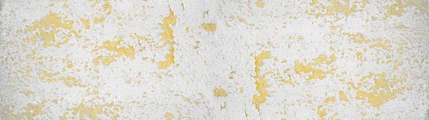 White yellow exfoliatedb peeled plaster facade wall texture background panorama banner long
