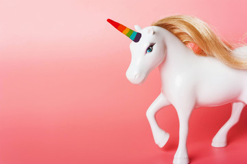 Unicorn with a horn of rainbow colors, LGBT flag