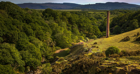 The chimney stack of the old abandoned Henllys Lime Kilns at Cwmllynfell in the Twrch valley in...