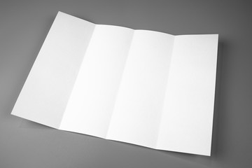 Blank portrait mock-up paper. brochure magazine isolated on gray, changeable background / white paper isolated on gray
