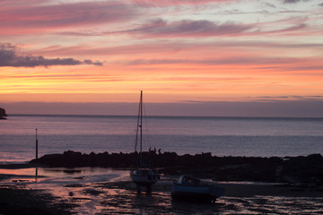 Fototapeta na wymiar Boats and sunset
